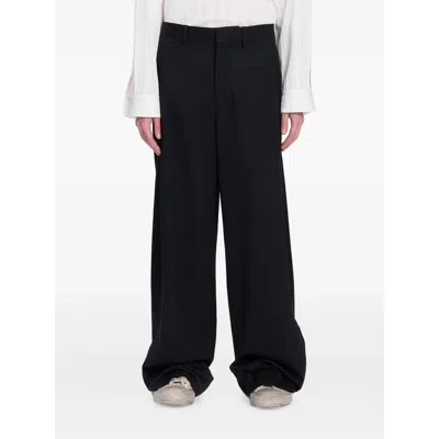 Ann Demeulemeester Wide-leg Virgin Wool Trousers In Black