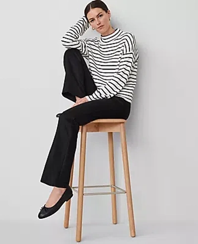 Ann Taylor The Petite Faux Suede Skinny Flare Pant In Black