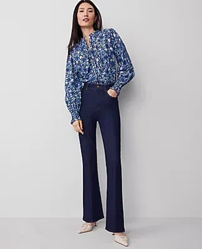 ANN TAYLOR THE PETITE FLARE JEAN