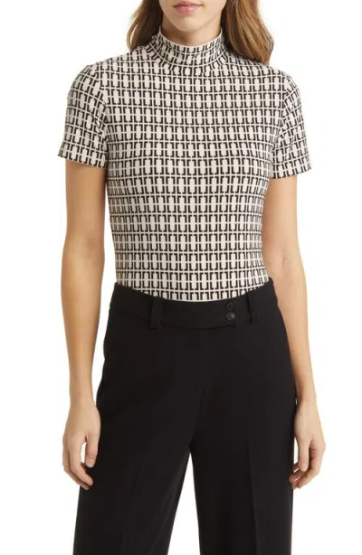 ANNE KLEIN ANNE KLEIN GEO PRINT SHORT SLEEVE MOCK NECK TOP