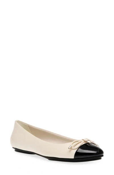 Anne Klein Luci Cap Toe Ballet Flat In Off White,black Smooth,patent