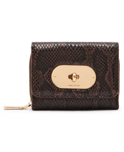 Anne Klein Oval Turn-lock Flap Trifold Wallet In Brown