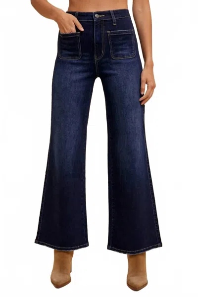 Anniewear Stretch Front Two Pocket High Rise Flare Jeans In Dark Denim In Blue