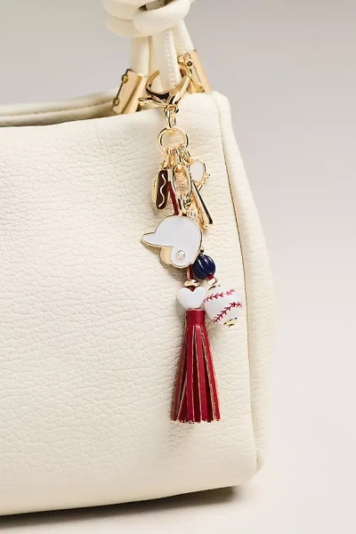 Anthropologie Baseball Bag Charm In Gold