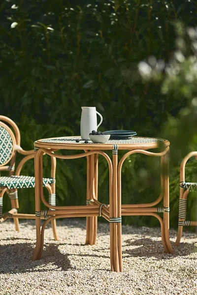 Anthropologie Coastal Indoor/outdoor Rattan Bistro Table In Brown