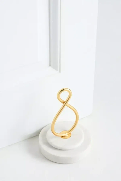 Anthropologie Haven Marble & Brass Doorstop In Gold