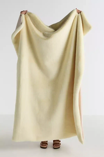 Anthropologie The Sophie Faux Fur Throw Blanket In Yellow