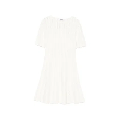 Antonino Valenti Dresses In White