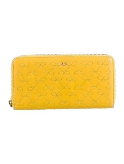 Pre-owned Anya Hindmarch Leather Continental Wallet In Yellow