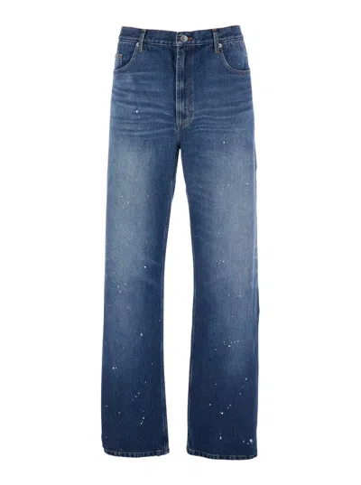 APC BLUE FIVE-POCKET JEANS WITH ALL-OVER PAINT EFFECT IN COTTON MAN