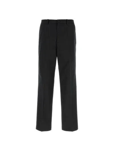 A.p.c. Press-stud Fastening Tapered Trousers In Black
