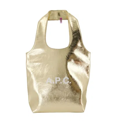 A.p.c. Logo Printed Metallic Effect Tote Bag In Gold