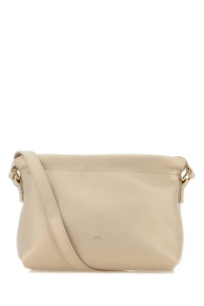 Apc A.p.c. Ninon Logo Embossed Mini Shoulder Bag In Beige