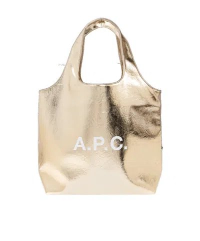 A.p.c. Ninon Logo Printed Shopper Bag In Gold