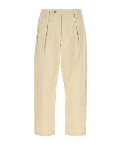 Apc Renato Tapered Pleated Herringbone Cotton Trousers In Neutral