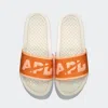 Apl Athletic Propulsion Labs Women's Big Logo Techloom Slide In Ivory/orange/neon Peach In Orange