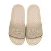 Apl Athletic Propulsion Labs Women's Big Logo Techloom Slide In Parchment In Multi
