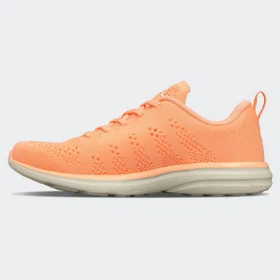 Apl Athletic Propulsion Labs Women's Techloom Breeze Sneaker In Neon Peach/pristine In Orange