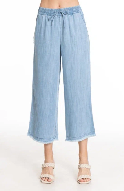 Apny Frayed Pull-on Crop Wide Leg Chambray Trousers In Light Indigo