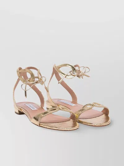 Aquazzura Metallic Bow Detail Flat Sole Sandals In Gold