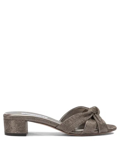 Aquazzura Nina 35 Mm Metallic Knot Block Heel Sandal In Multi