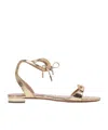 Aquazzura Metallic Bow Detail Flat Sole Sandals In Gold