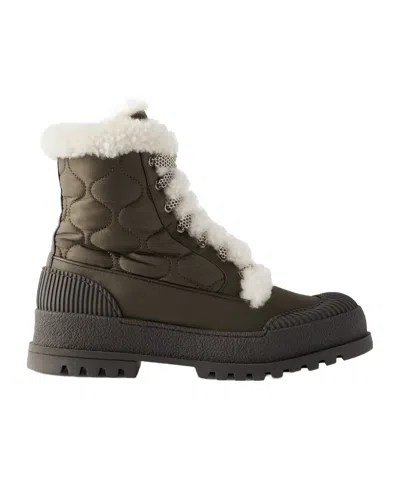 Aquazzura Shearling-lined Quilted Nylon And Leather Ankle Boots In Black