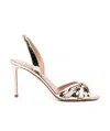 Aquazzura Tati 85 Metallic Leather Crossover Sandals In Nude