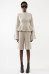 Arakii Heavy Knitted Peplum Turtleneck In White