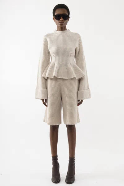 Arakii Heavy Knitted Peplum Turtleneck In White