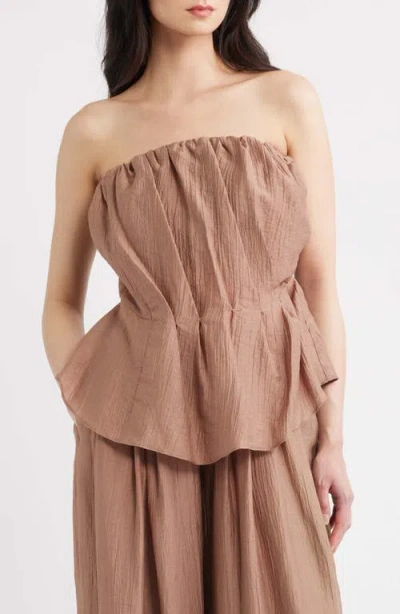 A.ren Lumin Pleated Strapless Peplum Top In Brown
