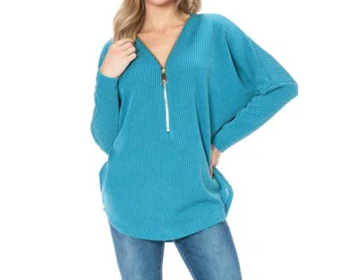 Ariella Dolman Sleeve Zipper Top In Turquoise In Blue
