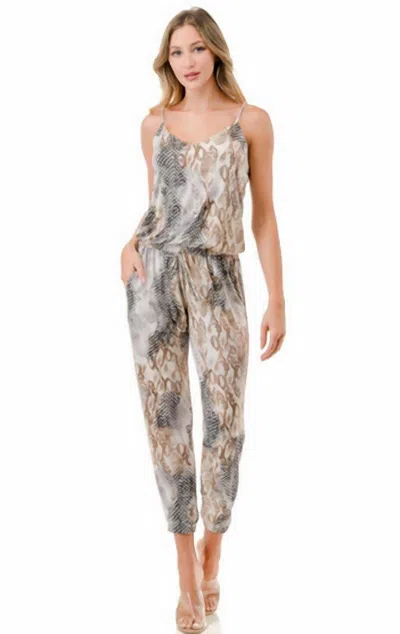 Ariella Snakeskin Print Jumpsuit In Black/tan/ivory In Multi