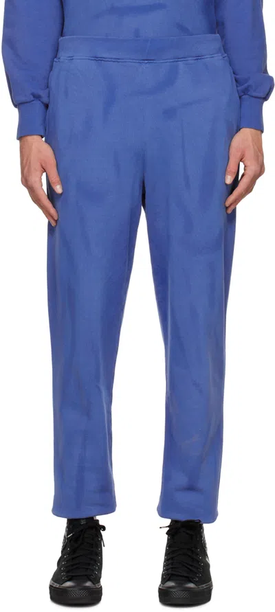 Aries Temple-print Sunbleached Cotton-jersey Track Pants In Blue