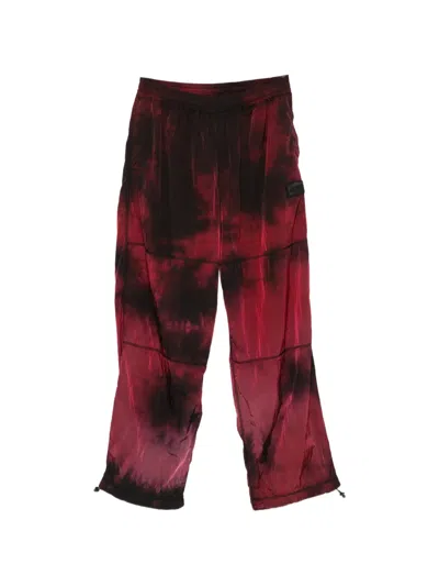 Aries Tie-dye Windcheater Trousers In Red