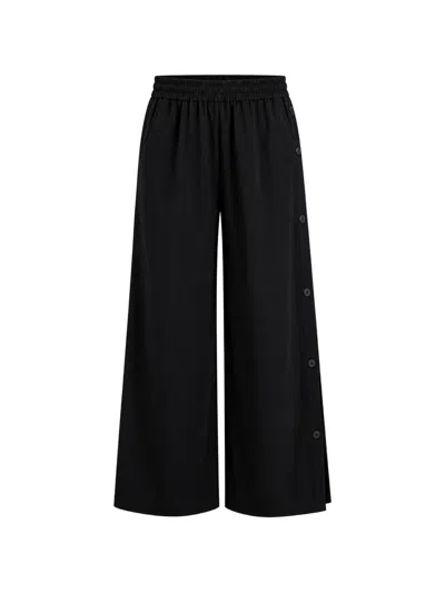Arlo Mott Baxter Side-buttons Trousers In Black