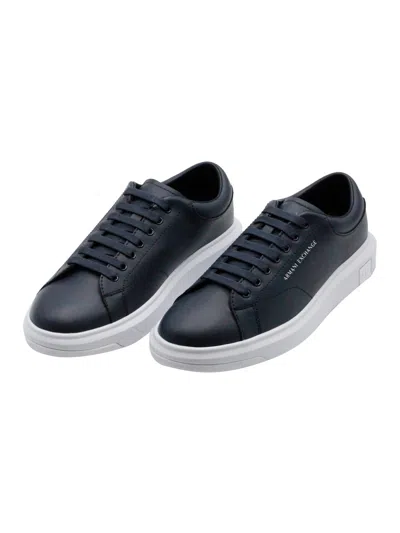 ARMANI COLLEZIONI LEATHER SNEAKERS WITH MATCHING BOX SOLE AND LACE CLOSURE. SMALL LOGO ON THE TONGUE AND BACK