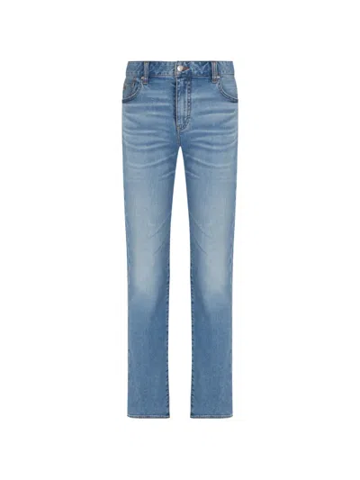 Armani Exchange Faded Whiskered Jeans In Blue