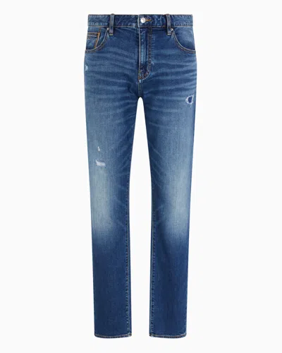 Armani Exchange J13 Slim Fit Jeans In Stone Washed Cotton Denim With Rips In Blue