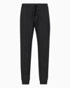 Armani Exchange Jogger Pants In Fabric With Allover Logo Pattern In Black