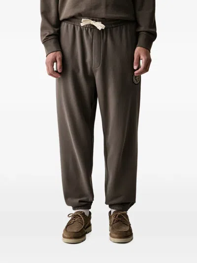Armani Exchange Logo-patch Drawstring Track Pants In Animal Print