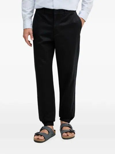 Armani Exchange Monogram-pattern Elasticated-cuff Trousers In Black