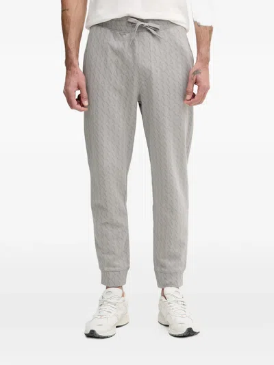Armani Exchange Monogram-pattern Track Pants In Brown