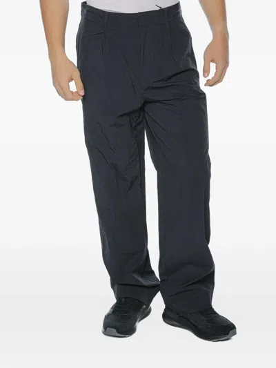 Armani Exchange Pleated-front Crinkled Trousers In Black