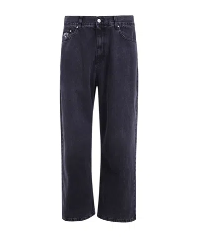 Arte Antwerp Faded-effect Logo-patch Jeans In Blue