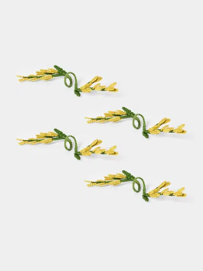 Artesanías Del Atlántico Set Of 4 Golden Flower Handwoven Palm Napkin Rings In Multi