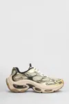 Ash Dragon Sneakers In Gold Leather And Fabric In White/black