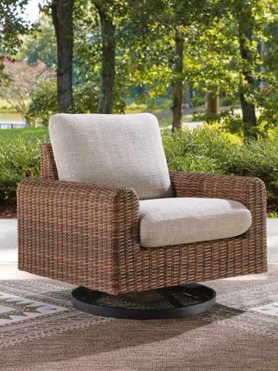Ashley Angel Island Outdoor Swivel Lounge Chair With Cushion In Brown