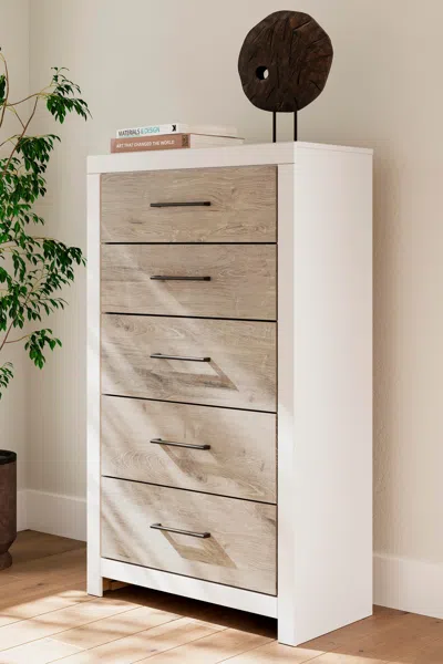 Ashley Charbitt 5 Drawer Chest Of Drawers In Neutral