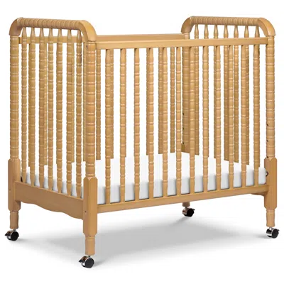 Ashley Davinci Jenny Lind 3-in-1 Convertible Mini Crib In Brown